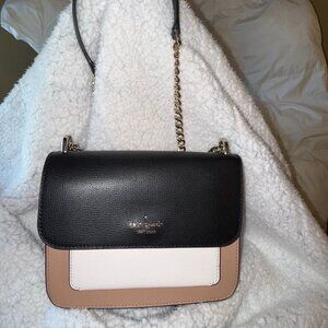 Kate Spade leather cream and tan and black crossbody like new condition.